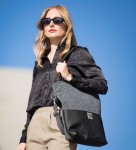 Grey bag made of thick woven fabric and eco leather.
